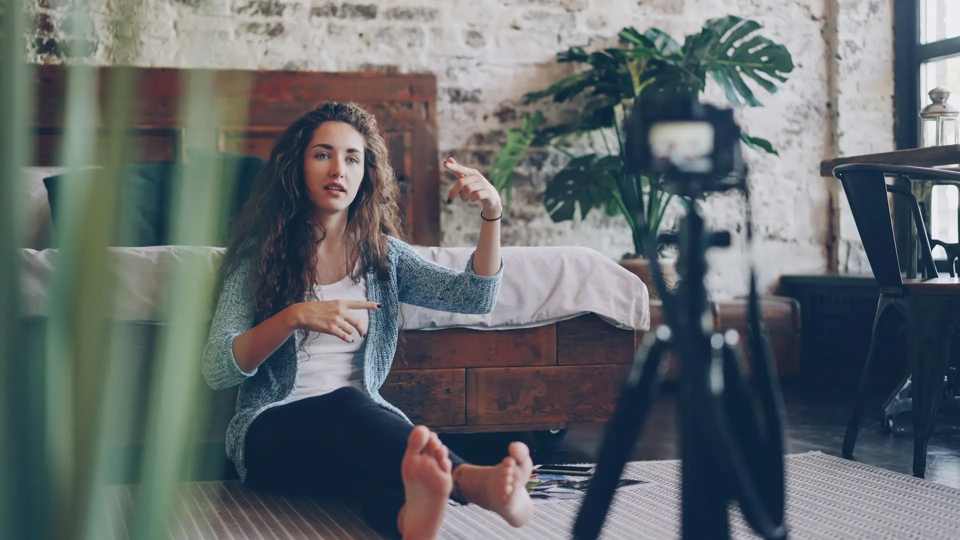 Woman recording a video in a stylish room