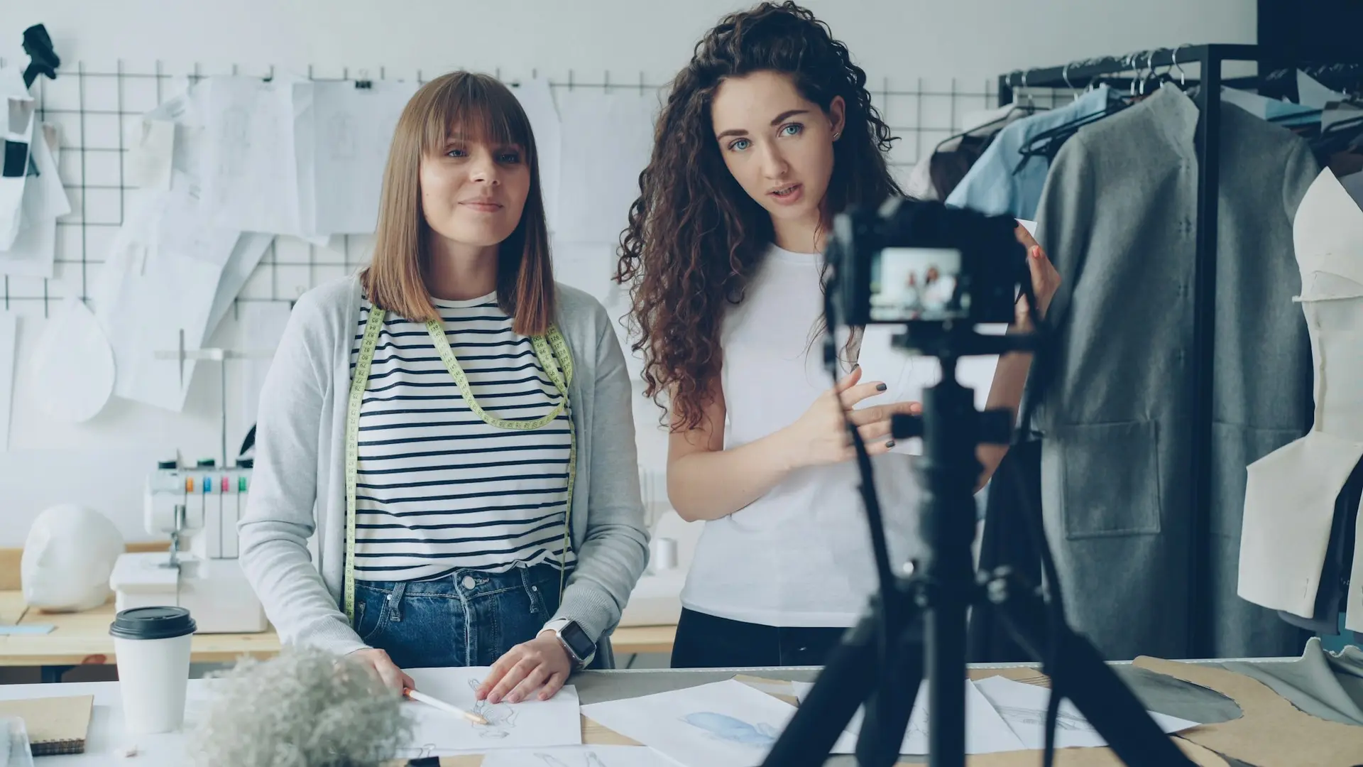 Two women filming a video about fashion