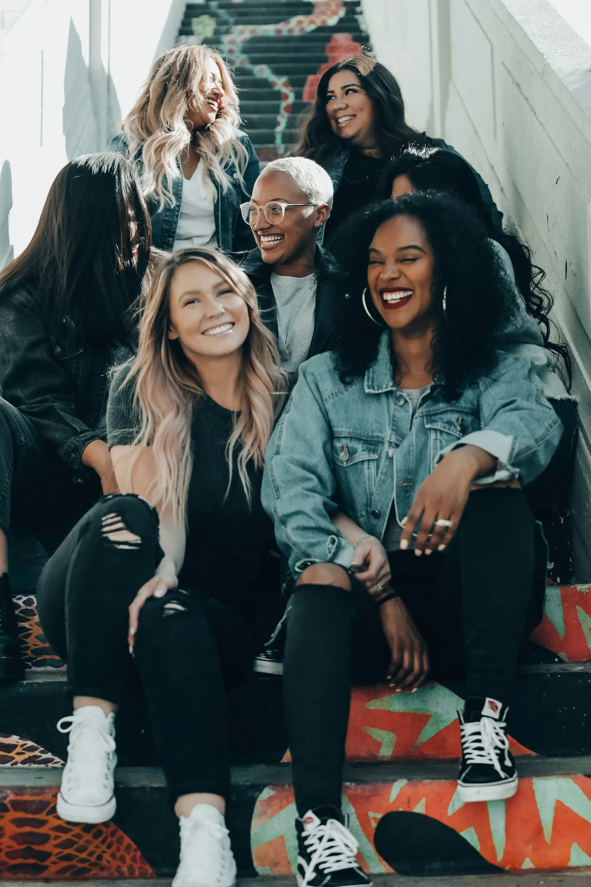 Women laughing on stairs