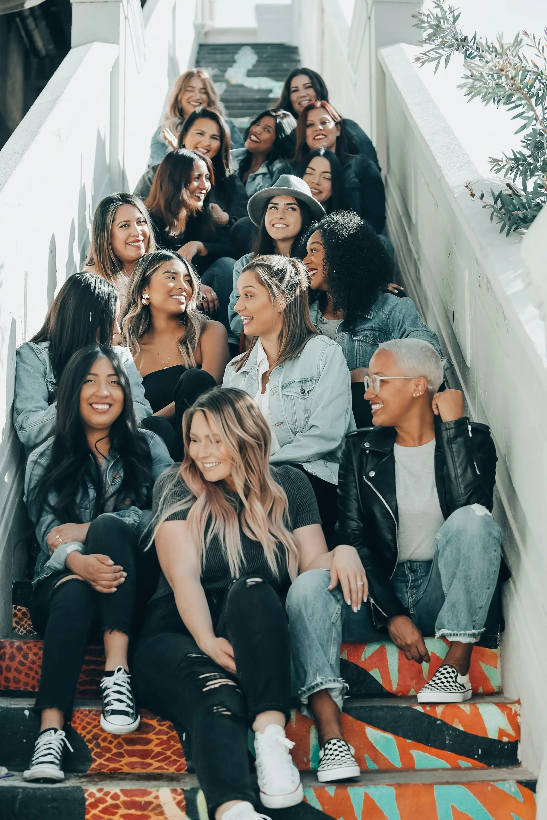 Group sitting on concrete stairs