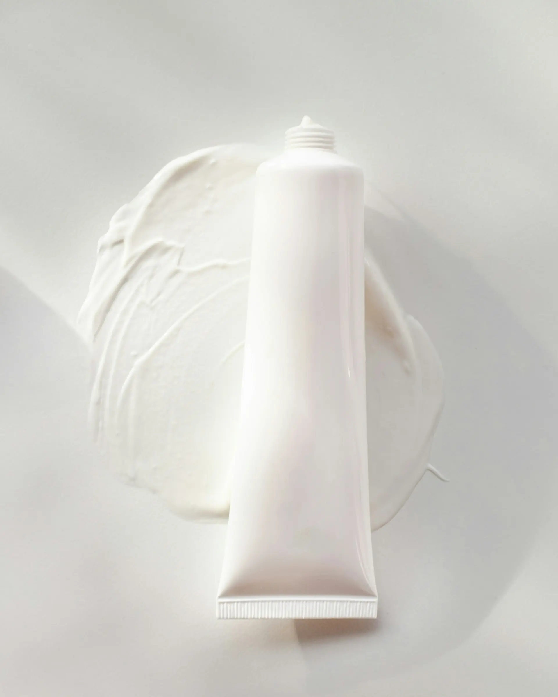 Tube of cream on a plate